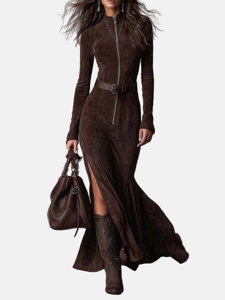 Woman wearing a brown suede dress with a matching handbag and boots on a white background