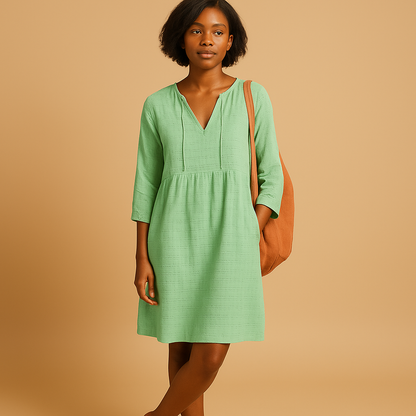 Knee length summer dress for women with short sleeves and flattering fit, perfect for casual outings, work, and warm-weather occasions.