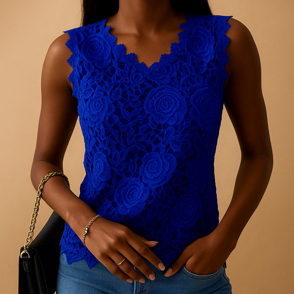Women’s lace blouse with a round neckline and elegant details, designed for comfortable everyday wear and versatile styling.