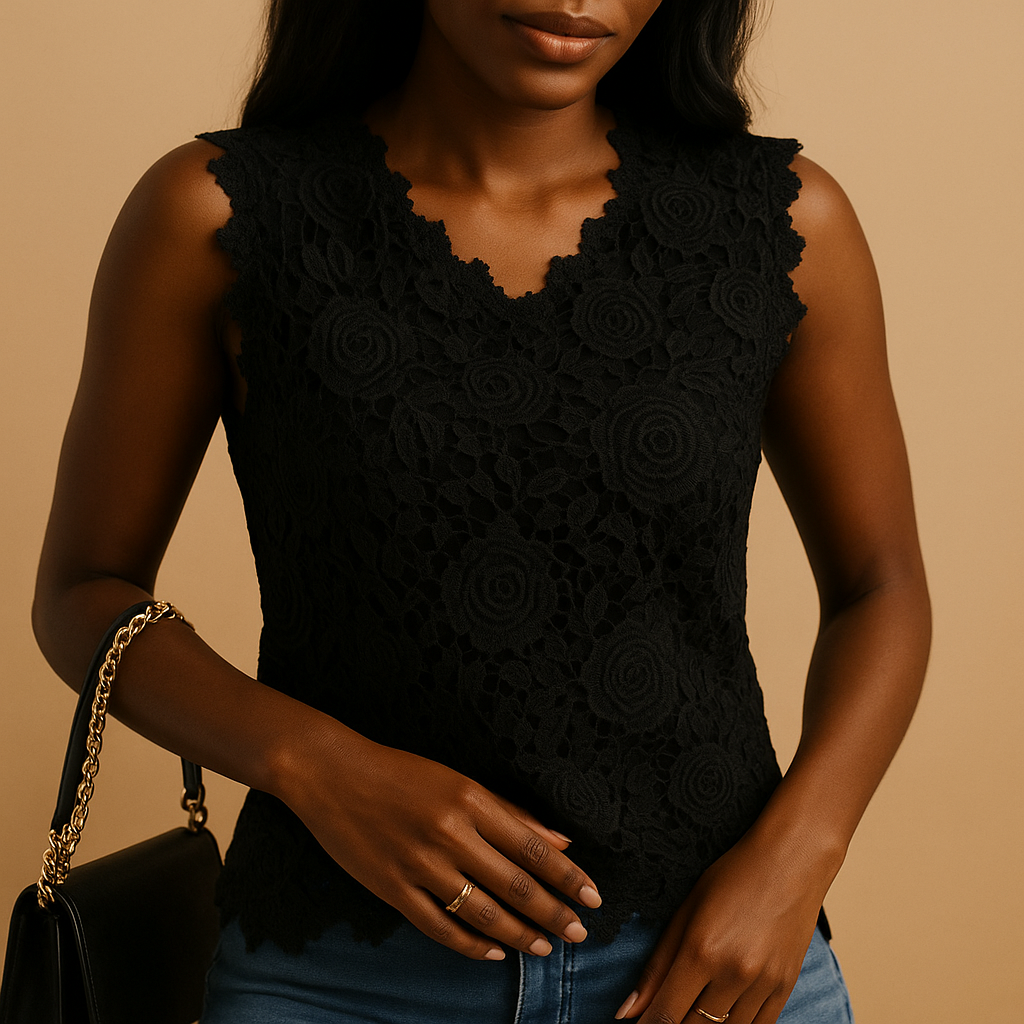 Women’s lace blouse with a round neckline and elegant details, designed for comfortable everyday wear and versatile styling.