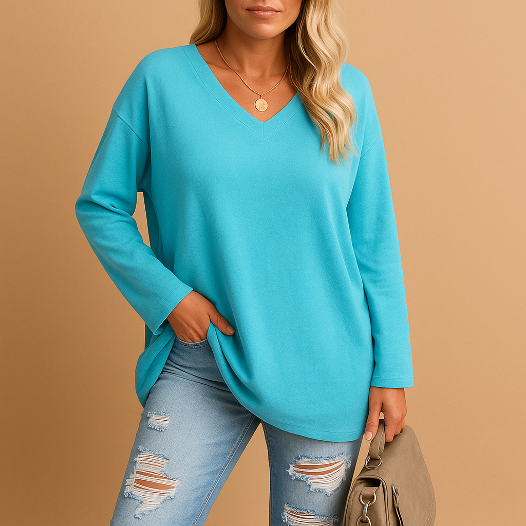 Lightweight summer top for women with a relaxed fit and short sleeves, suitable for casual wear, warm days, and everyday summer outfits.