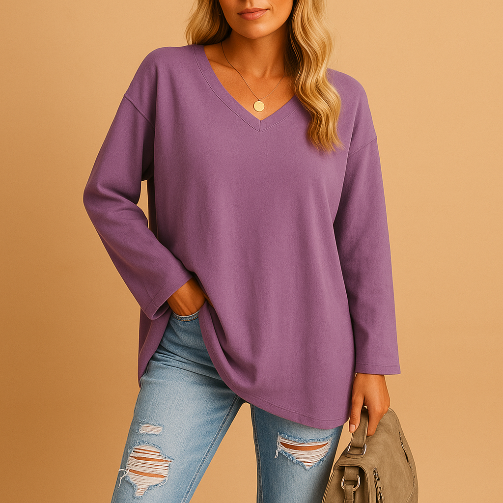 Lightweight summer top for women with a relaxed fit and short sleeves, suitable for casual wear, warm days, and everyday summer outfits.