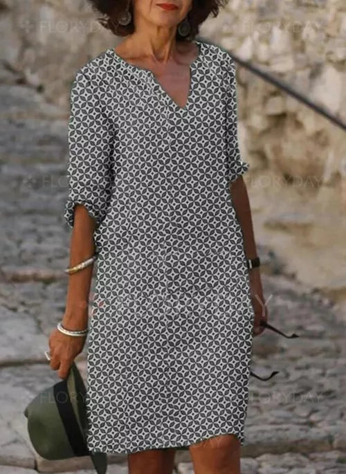 Image of Riley | Women's V-Neck Midi Dress