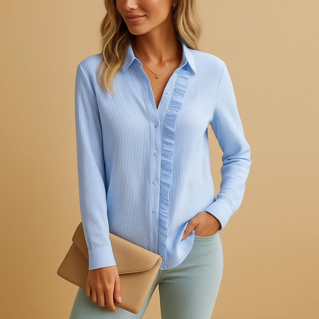 Women’s striped blouse with ruffles and button details in a lightweight, soft design, ideal for everyday wear and dressed occasions.